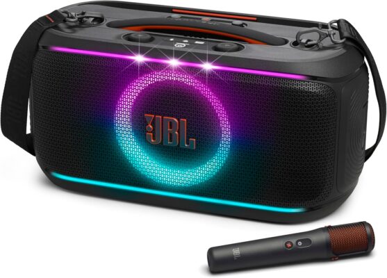 JBL PartyBox On-The-Go 2 - مكبر صوت حفلات محمول مزود بميكروفون رقمي لاسلكي واحد، ومقبض حمل، وحزام للكتف، وعرض إضاءة ديناميكي، ومدة تشغيل تصل إلى 15 ساعة، ومقاوم لرذاذ الماء، ويدعم تقنية Auracast™.